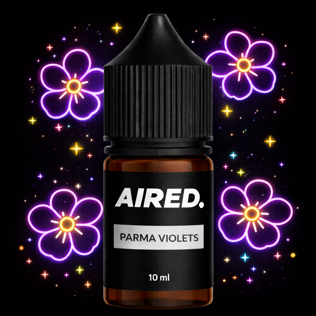 AIRED Parma Violets e-liquid bottle with decorative flowers on a black background