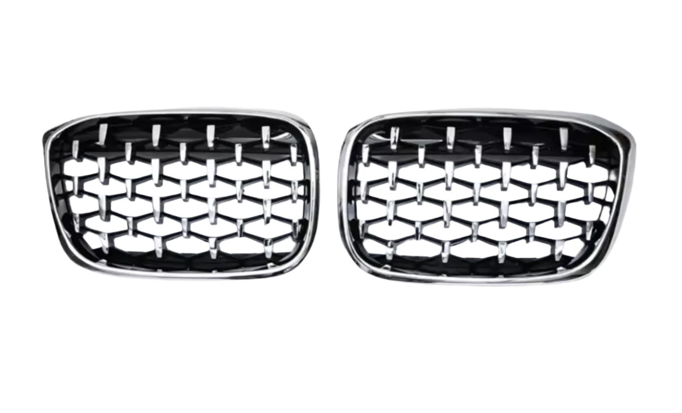 Two car grills with black and silver design on a white background