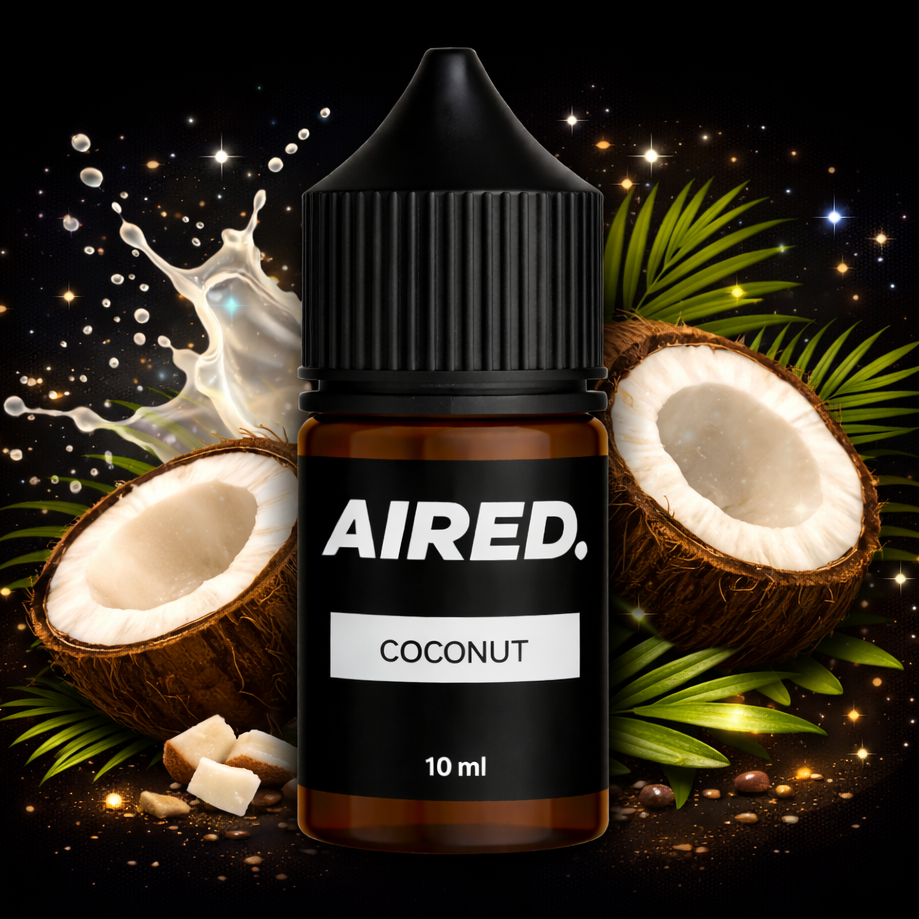 Bottle of AIRED Coconut e-liquid with coconut halves and leaves on a dark background