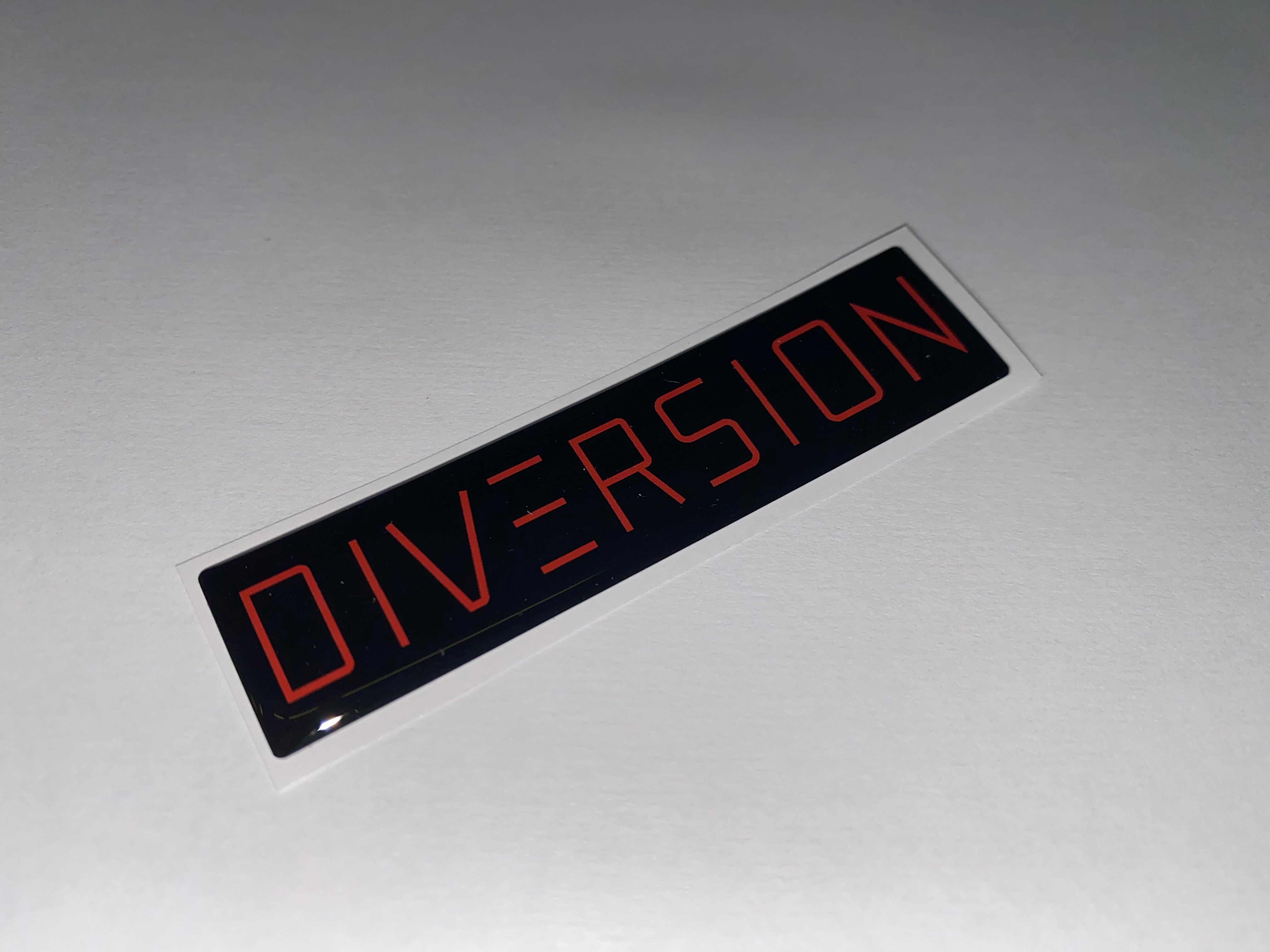 DIVERSION Red Gel Badge / Self Adhesive (8cm x 2cm)