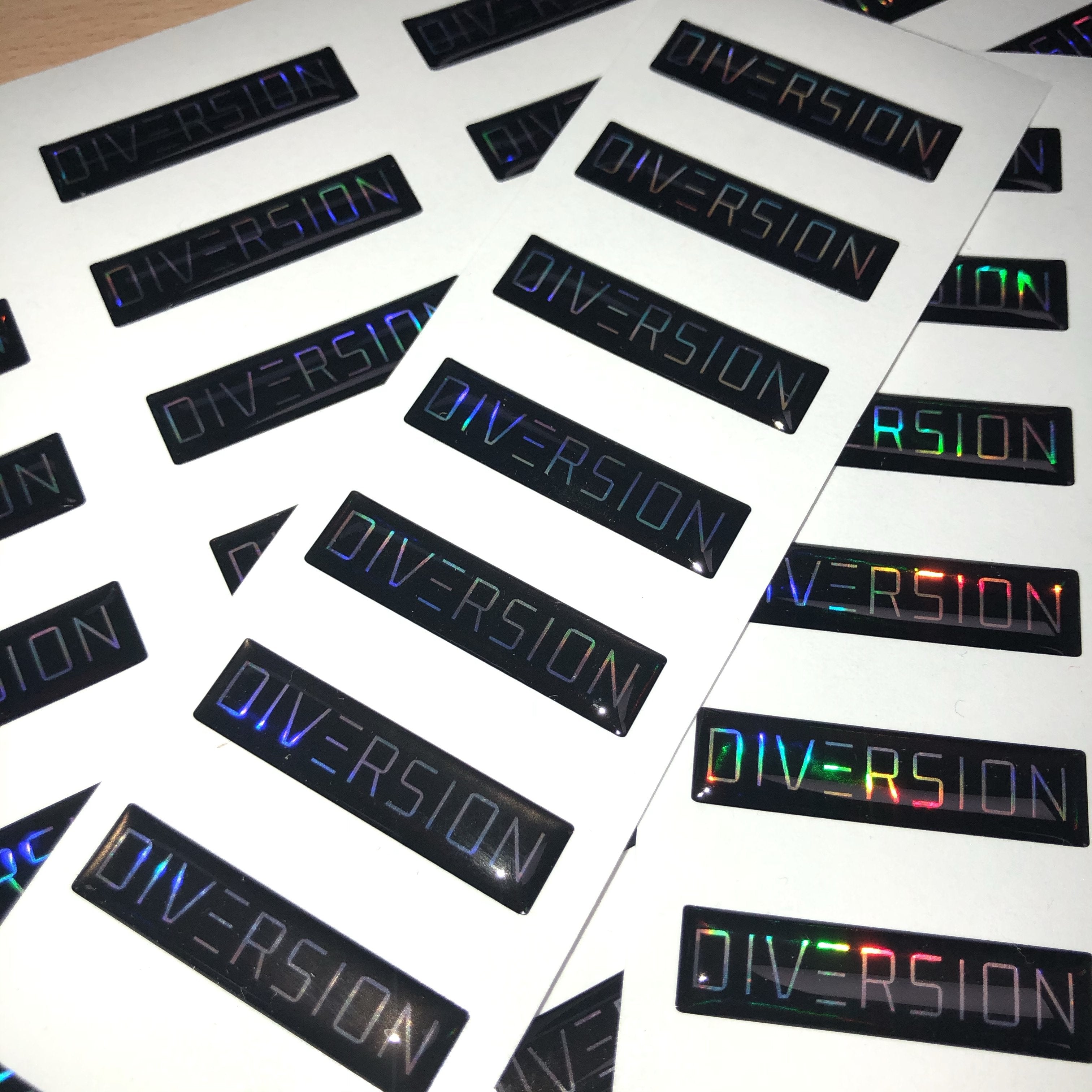 DIVERSION Neo Chrome / Oil Slick Domed Gel Badge (4CM x 1CM)